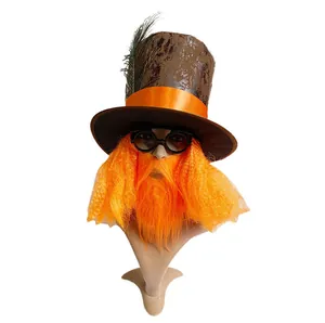 Detailed shot of a Halloween steampunk top hat featuring an orange beard and vintage glasses