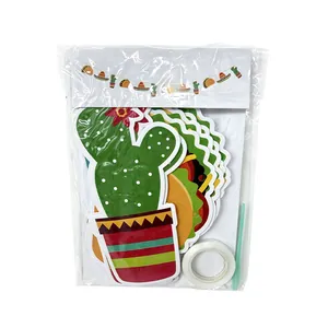 Complete package of Mexican fiesta party decorations featuring cactus and taco paper cutouts