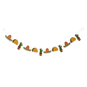 Detailed view of Mexican fiesta garland featuring taco, sombrero and cactus paper cutouts