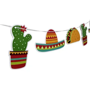 Close-up of Mexican party banner featuring paper taco, sombrero, and cactus cutouts