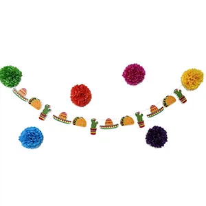 Detail view of Mexican fiesta banner with taco sombrero cactus icons and colorful pom poms