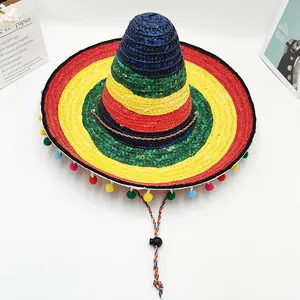 Detailed view of a colorful Mexican sombrero hat with vibrant pom-poms and woven texture