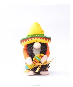 Macro view of a Mexican carnival gnome plush toy wearing a yellow sombrero and maracas