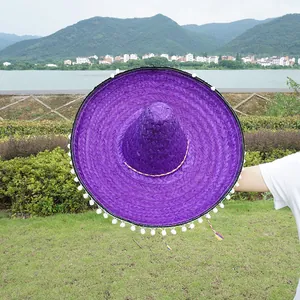 Large purple Mexican sombrero with white pom-poms for Halloween and festival parties