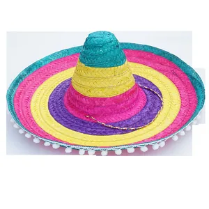 Vibrant colorful Mexican straw sombrero hat with white pom-pom trim for parties