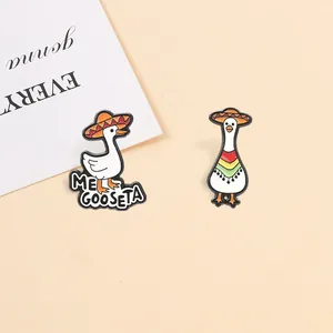Detailed view of Mexican sombrero goose enamel pins with humorous Me Goose Ta pun