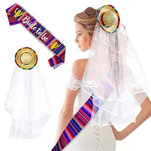 Detail view of the colorful Mexican fiesta bride to be sash and mini sombrero veil.
