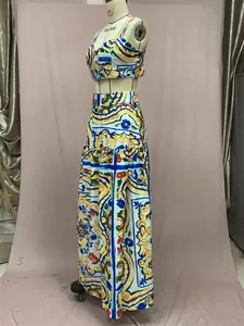Two-piece summer set featuring blue and yellow Majolica tile print on a maxi skirt and top