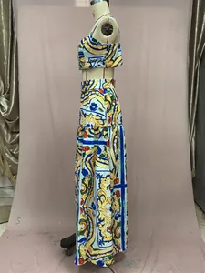 Side view of bohemian two-piece Mediterranean print set with crop top and long maxi skirt