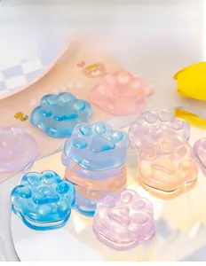 Detailed view of transparent cat paw jelly squishy toys in various vibrant pastel colors