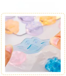 Detail view of the elastic material of a cat paw shaped jelly squishy stress toy
