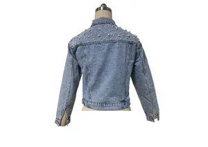 Women's light blue cropped denim jacket featuring elegant pearl beads on shoulders back view