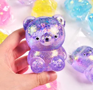 Glitter paarse aurora moutsuiker beer squishy speeltje voor stressverlichting detail