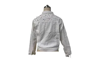 Back detail of a white loose-fit denim jacket featuring delicate pearl bead decorations