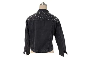 Rear view of black denim jacket featuring elegant pearl bead details on the shoulders