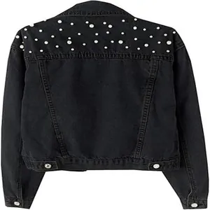 Back detail of black denim jacket with elegant pearl bead decorations