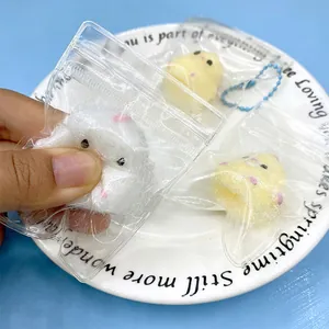 Süße gelbe und weiße beflockte Küken-Squishy-Spielzeuge zum Stressabbau in Beuteln
