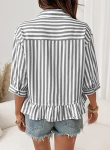 Back view of a casual grey striped shirt with 3/4 sleeves and stylish ruffle hem.