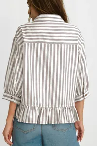 Detailed back view of a grey and white striped shirt with ruffled hem and buttoned sleeves