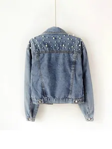 Women's cropped blue denim jacket featuring elegant white pearl embellishments on the back.