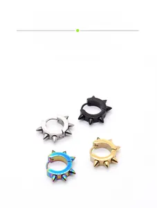 Detail view of punk stainless steel rivet hoop earrings in four assorted colors