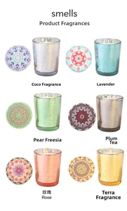 Various scented candles in colored mercury glass jars with decorative mandala lids.
