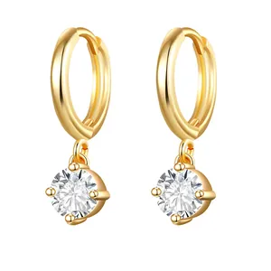 Elegant gold hoop earrings with sparkling round zircon dangles on white background