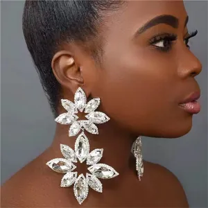 Luxury exaggerated sparkling clear crystal flower dangle earrings for elegant evening gala attire