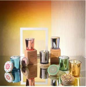 Detail view of colorful metallic starry sky scented candles with patterned wooden lids
