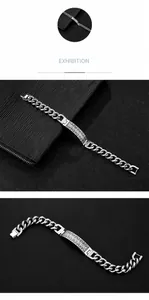 Detail view of men's stainless steel bracelet with hollowed Greek key pattern