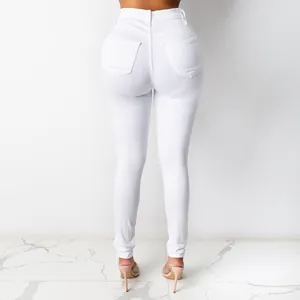 Back view detail of high-waisted white skinny jeans featuring rear pockets and a slim fit