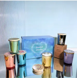 Detailed close-up of a colorful starry scented candle set in a premium blue gift box