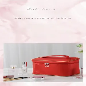Elegante borsa trucco rossa portatile di grande capacità con cerniera lampo dorata