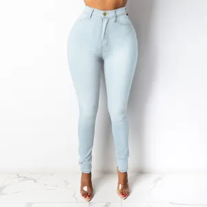 Full front view showing the fit and light blue wash of women's high-waisted skinny jeans.