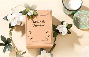 Close-up of scented candle packaging with Relax & Unwind text and mandala lid detail