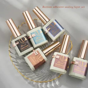 Bomd Profi-Nagelgel-Set mit Unterlack und Überlack auf dekorativem Glasteller.