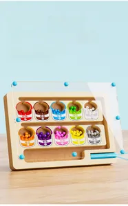 Detail view of high transparency acrylic panel on wooden magnetic bead maze toy