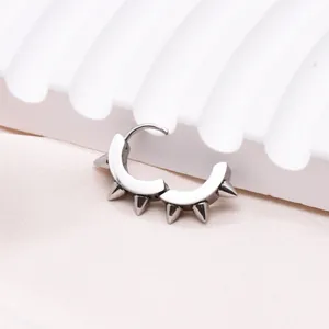 Punk style stainless steel hoop earring with cone spikes for a street hip hop look