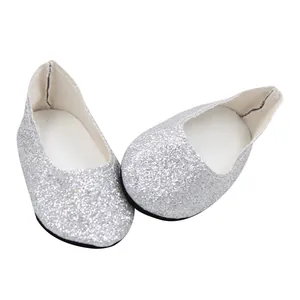Close-up detail of shiny silver glitter flat shoes for 18-inch American girl dolls