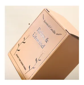 Detail view of premium scented candle packaging box with UV embossed text texture