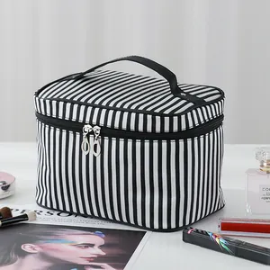 Large capacity portable black and white striped makeup bag for travel and storage