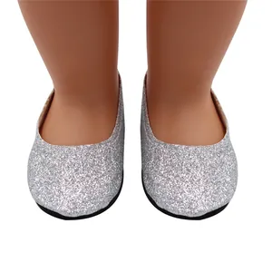 Close-up detail of sparkling silver glitter flat shoes designed for 18-inch baby dolls