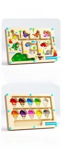 Detailed view of dinosaur and ice cream themed magnetic bead maze board toys