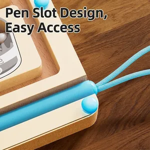Detail view of wooden magnetic bead maze logic toy showing pen slot storage design