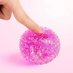 Balle anti-stress rose scintillante à texture diamant pour relaxation sensorielle