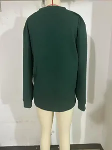 Back view of men's dark green waffle-knit long-sleeved shirt shown on a mannequin.