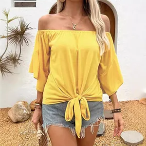 Chic yellow off-the-shoulder top with a front tie-knot detail for summer style.