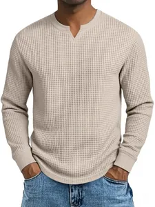 Detailed view of the soft beige waffle knit texture on this men's casual long-sleeve V-neck shirt