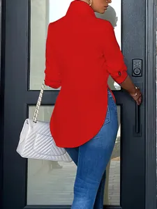 Rear view of a fashionable red long-sleeved shirt with irregular high-low hem design