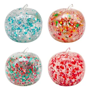 Set di 4 giocattoli antistress a forma di mela di Natale con glitter e gel colorato